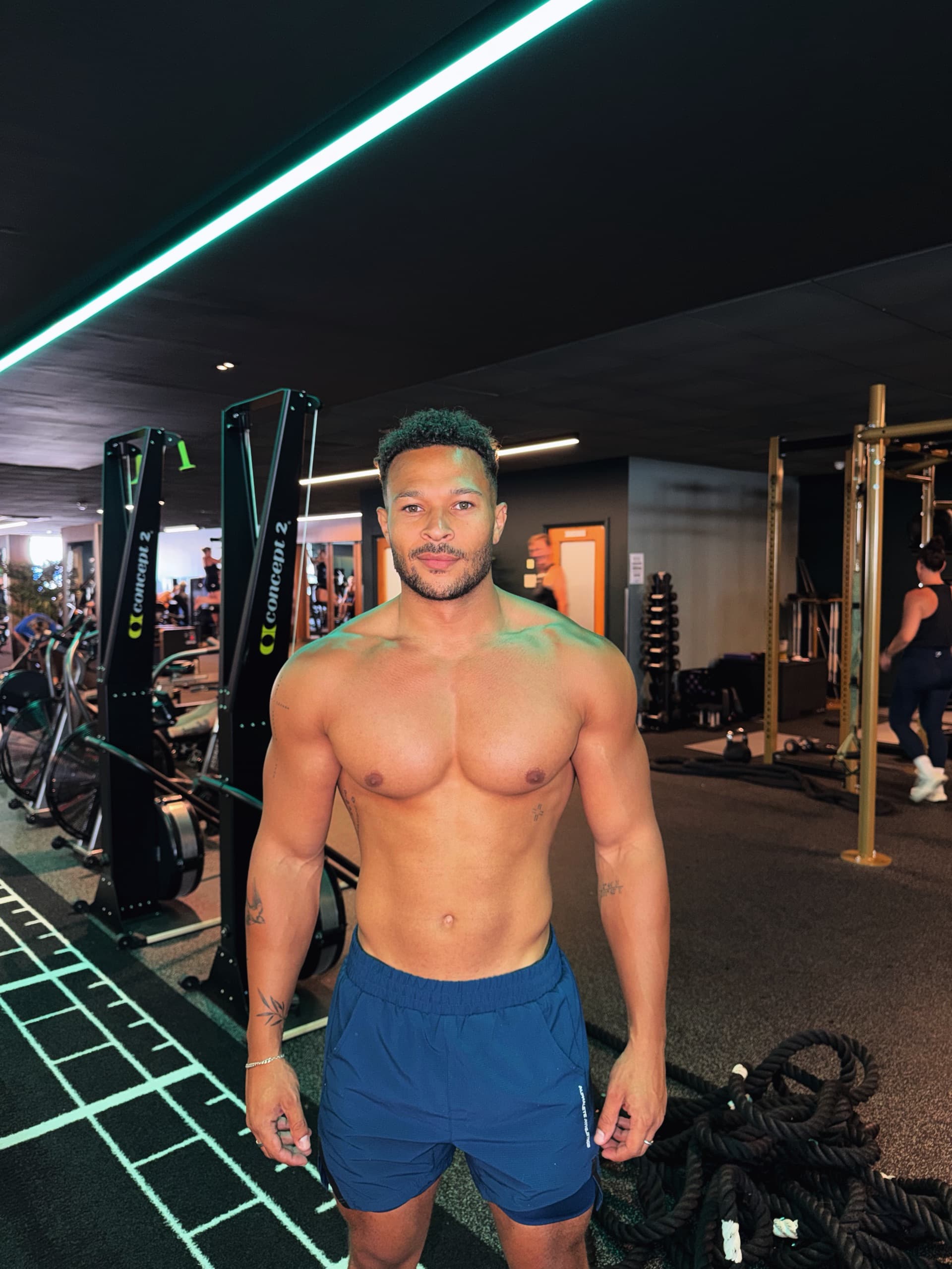 Cole Anderson James standing front on in the gym